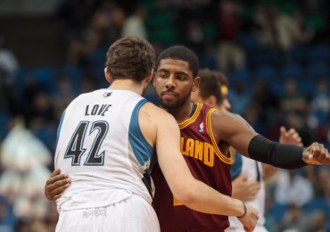 Kevin Love hugs Kyrie Irving