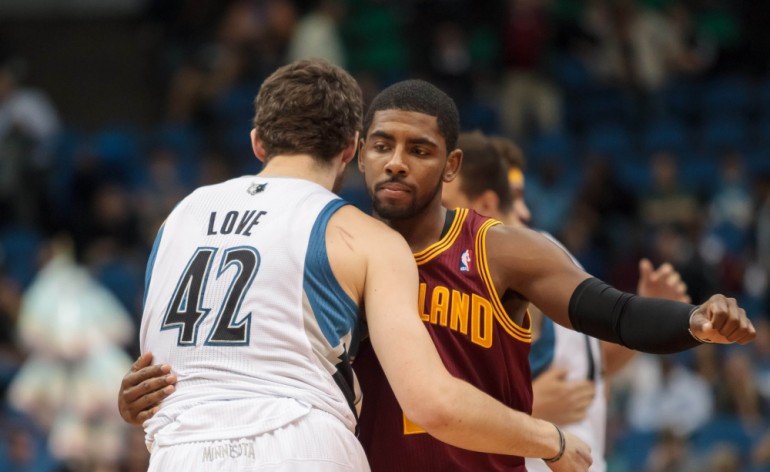 Kevin Love hugs Kyrie Irving